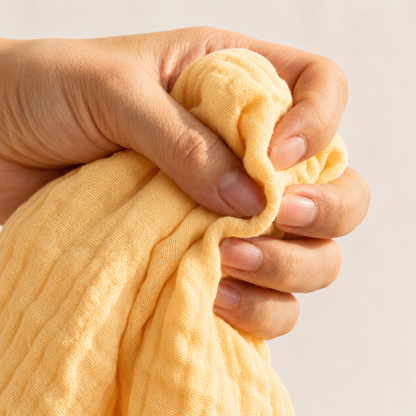 Mousselia™ – La couverture en mousseline de coton qui vous enveloppe de douceur