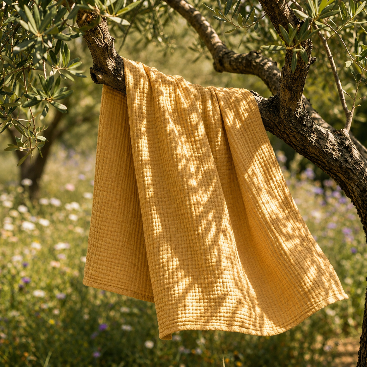 Mousselia™ – La couverture en mousseline de coton qui vous enveloppe de douceur